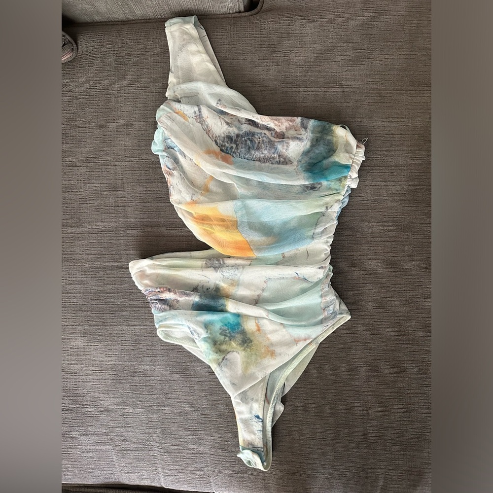 Beautiful, one shoulder bodysuit